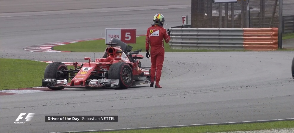 Vettel’s destroyed Ferrari after a post-race incident. He’s also shown to be “driver of the day”.
